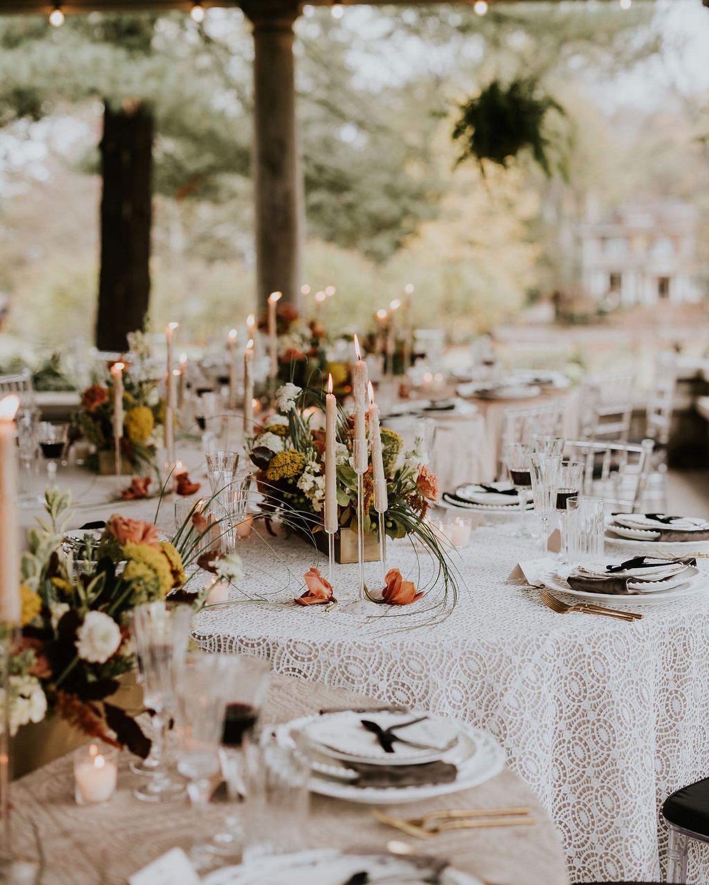 Candlelit reception with lace tablecloths
