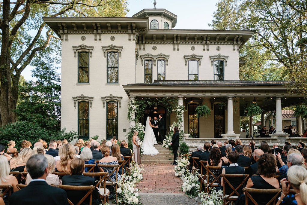 Wedding ceremony in front of the Peterson-Dumesnil House